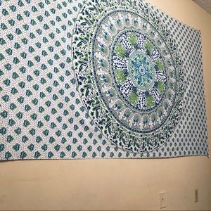 A blue and green tapestry